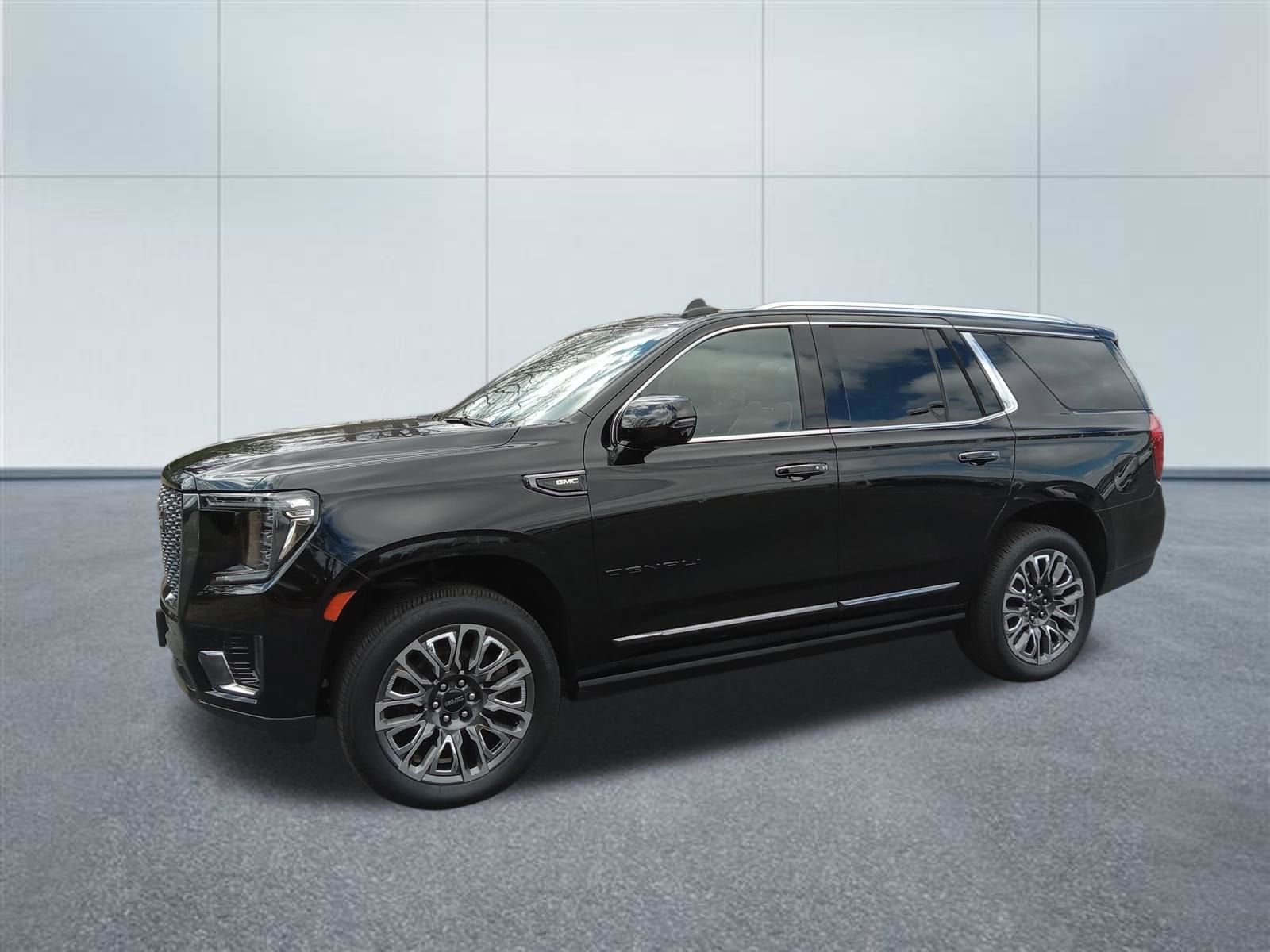 2023 GMC Yukon Denali Ultimate in Onyx Black — front three-quarter view