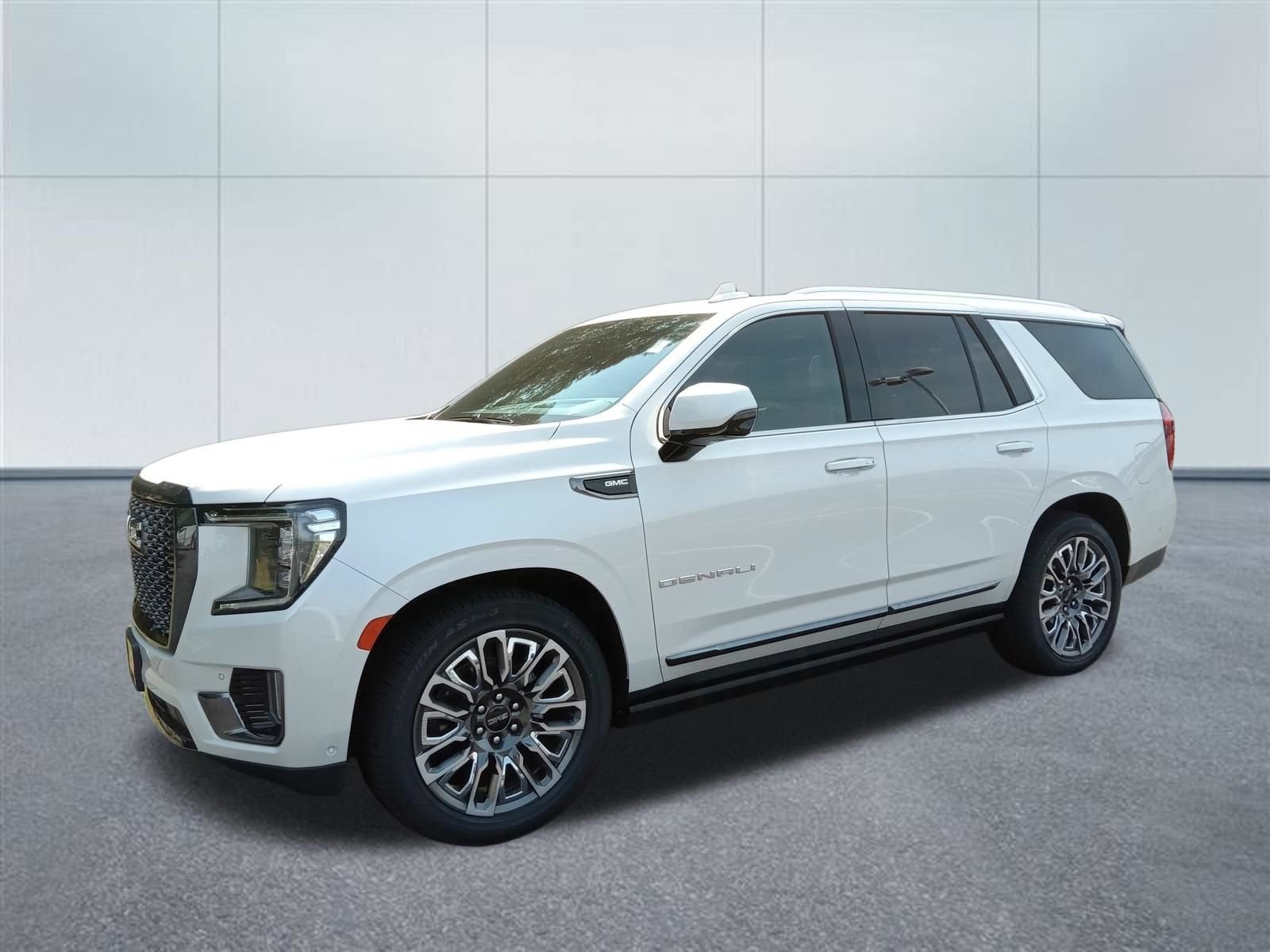 2023 GMC Yukon Denali Ultimate in White Frost Tricoat — front three-quarter view