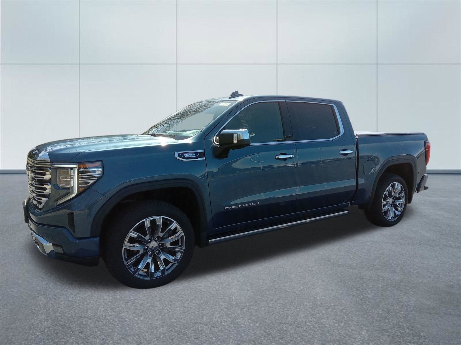 2026 GMC Sierra 1500 Denali in Downpour Metallic — front three-quarter view