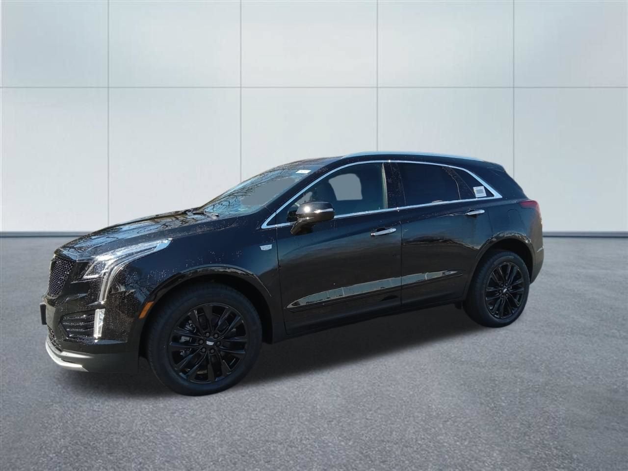 2026 Cadillac XT5 Premium Luxury in Stellar Black Metallic — front three-quarter view
