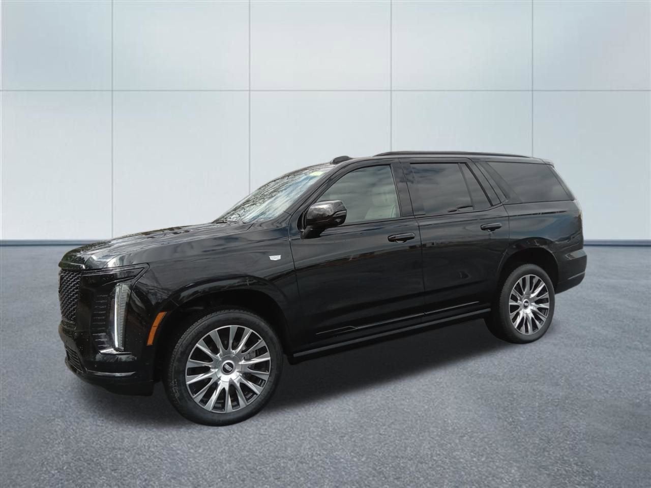 2026 Cadillac Escalade Sport in Black Raven — front three-quarter view