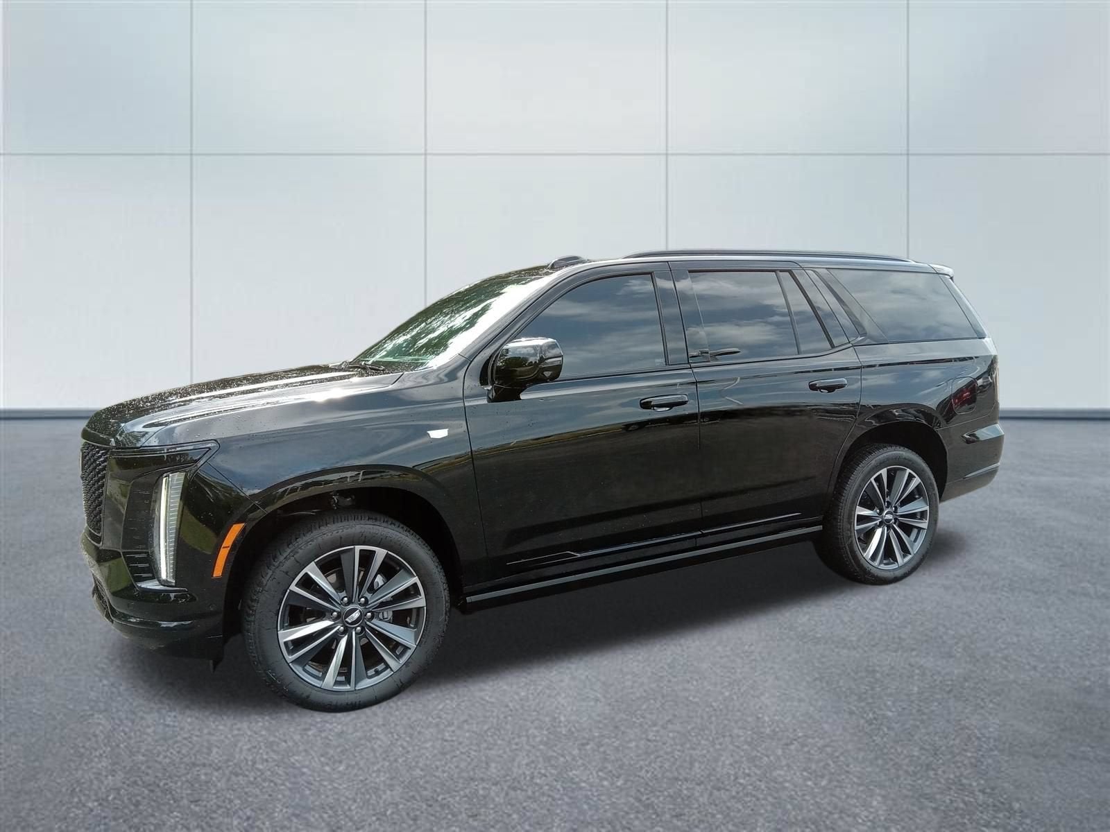 2026 Cadillac Escalade Platinum Sport in Black Raven — front three-quarter view