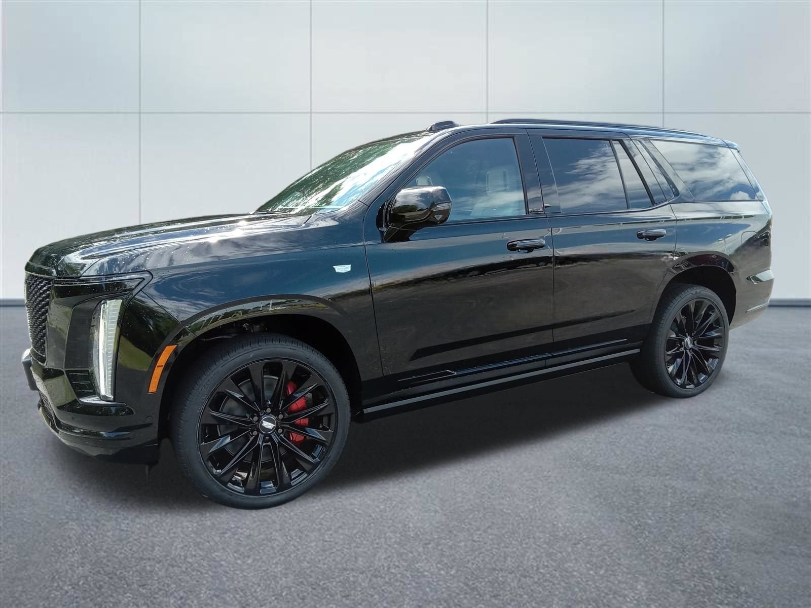 2026 Cadillac Escalade Platinum Sport in Black Raven — front three-quarter view
