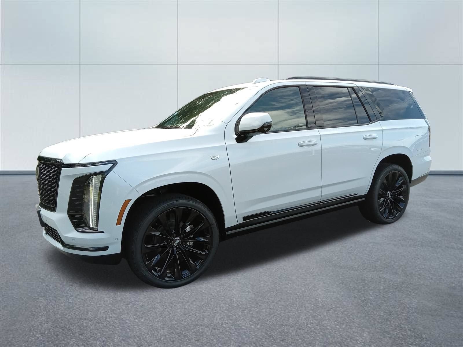 2026 Cadillac Escalade Platinum Sport in Vibrant White Tricoat — front three-quarter view